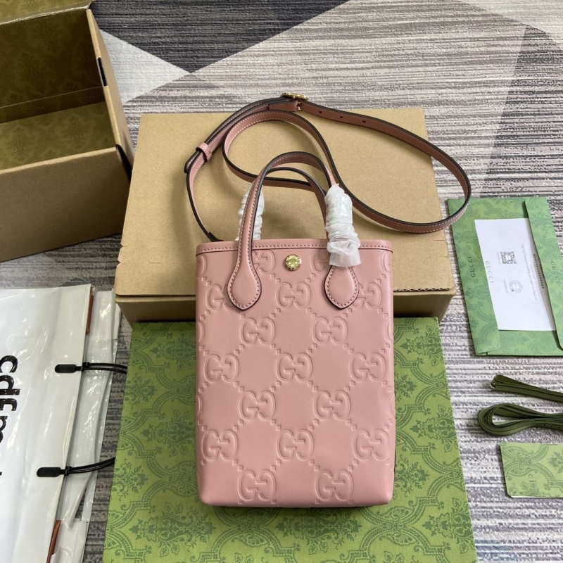 G*u*i top handle bags